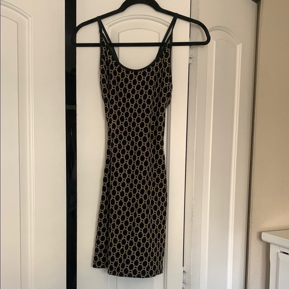 Elegant Black and Gold Patterned Dress